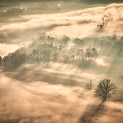 The Adda River shrouded in fog.