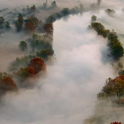 The Adda River shrouded in fog.