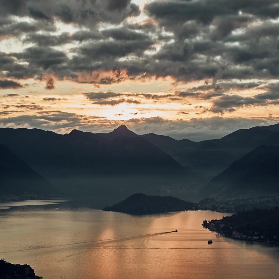 Lombardy, bathed in the golden glow of the setting sun.